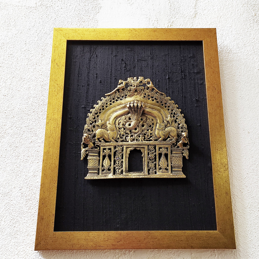Majestic Brass Temple Prabhavali With Mythical Markaras & Peacocks Framed On Black Raw Silk. Ht 45 cm x W 35 cm