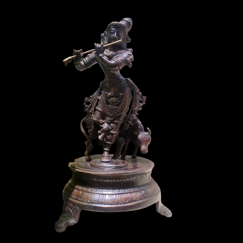 Brass Sculpture of Lord Krishna With The Sacred Cow In A Rich Dark Brown Patina - Ht 25 cm