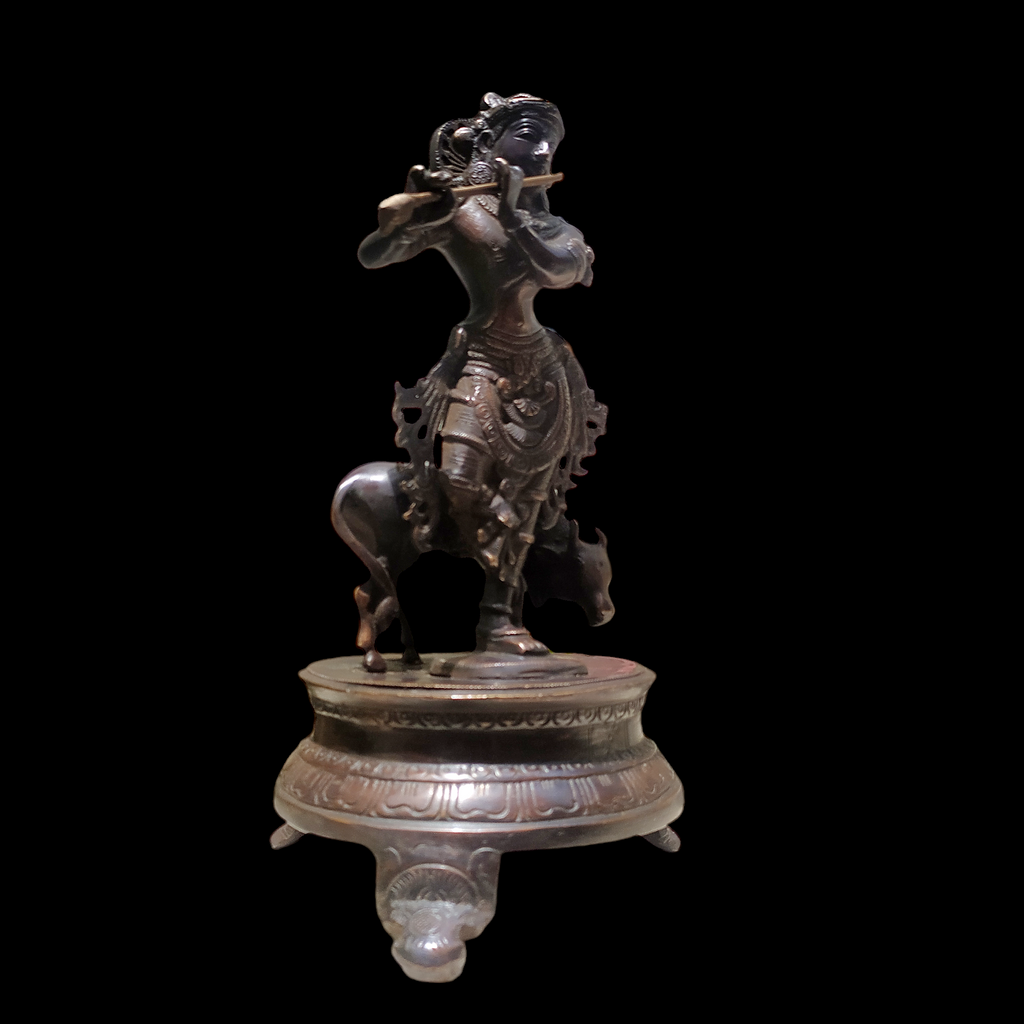 Brass Sculpture of Lord Krishna With The Sacred Cow In A Rich Dark Brown Patina - Ht 25 cm