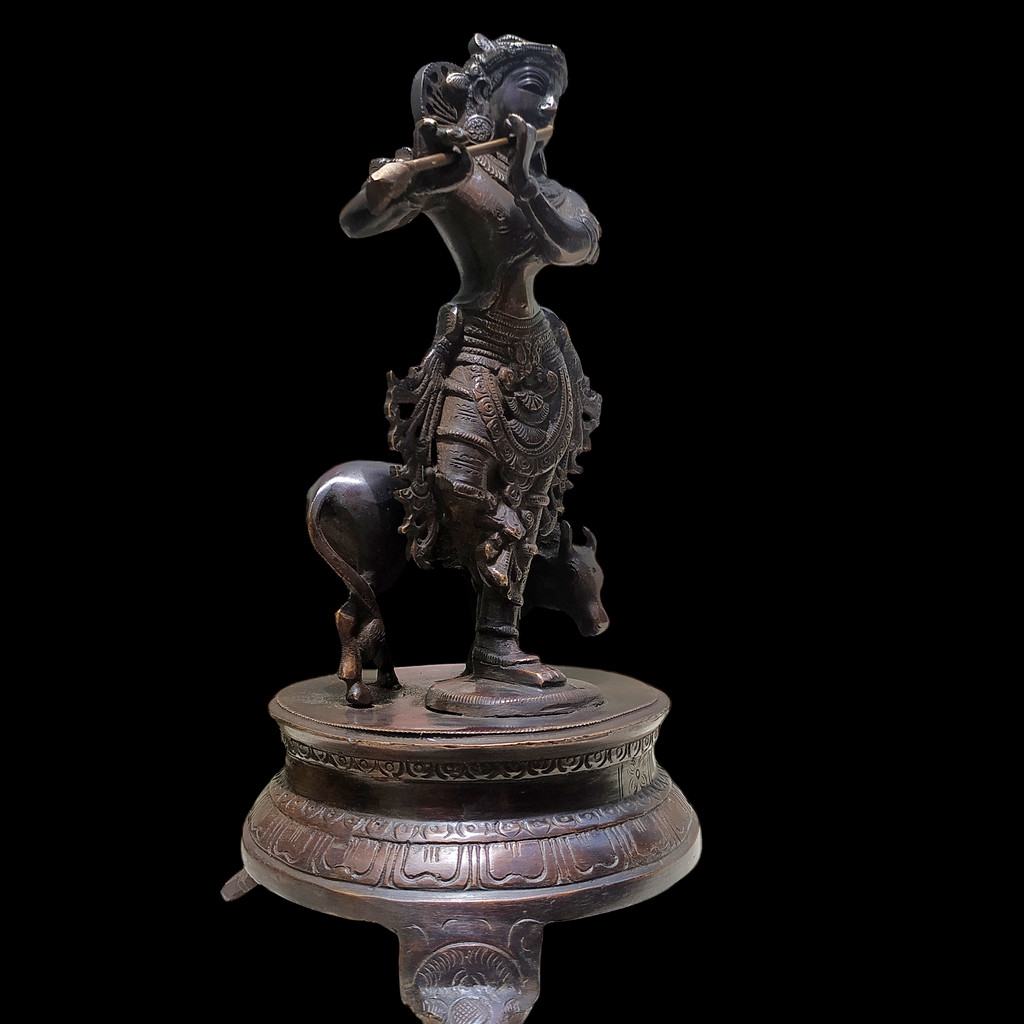 Brass Sculpture of Lord Krishna With The Sacred Cow In A Rich Dark Brown Patina - Ht 25 cm