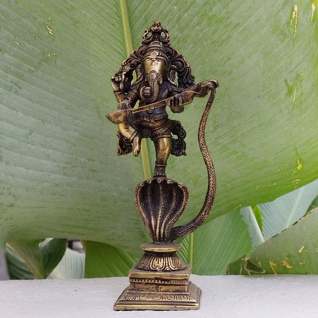 Brass Sculpture Of Lord Ganesha Dancing on Kaliya - The 5 Headed Serpent. Ht 26 cm x W 11 cm