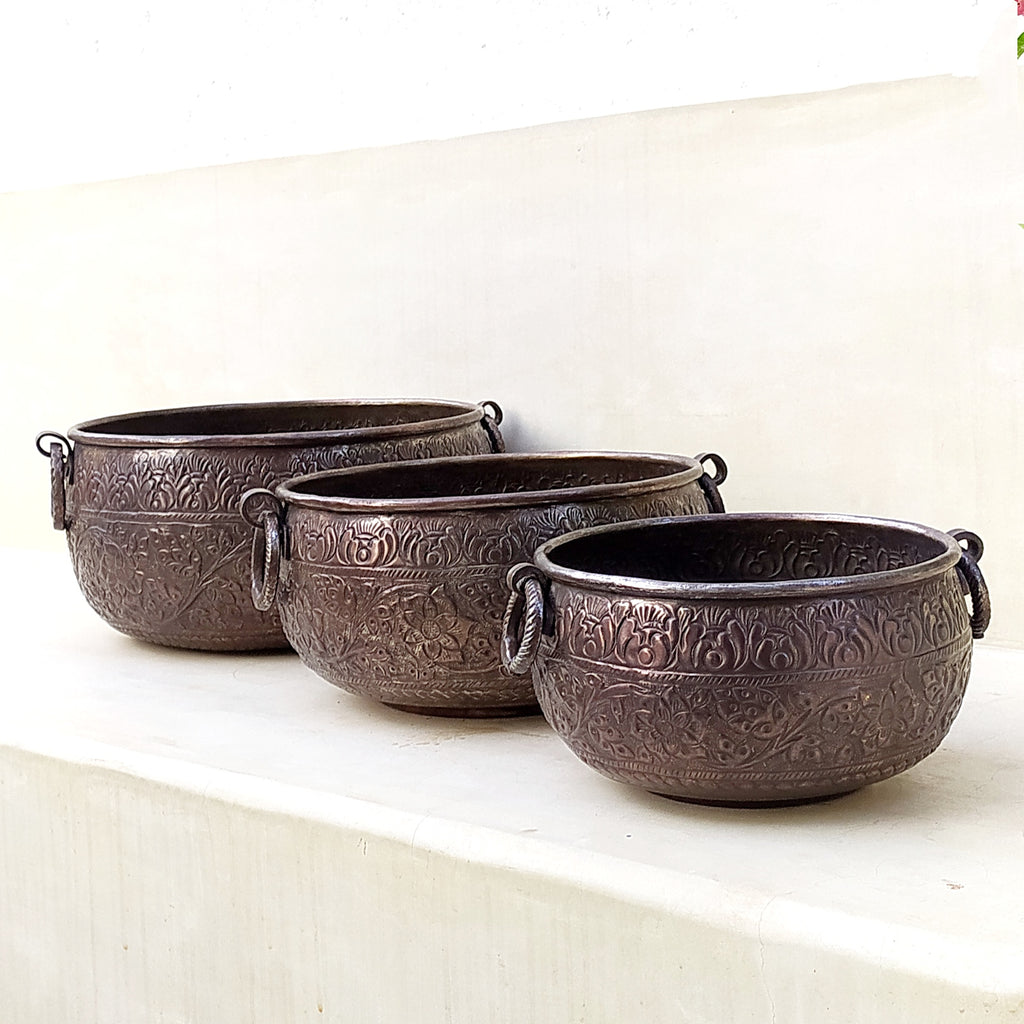 Set of 3 Brass Planters With A Rich Brown Patina Embossed with Floral Motifs. Diameter 30 | 26 | 20 cm x Height 16 | 13 | 11 cm