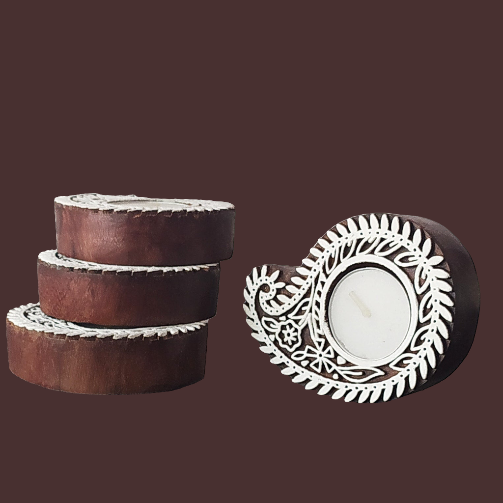 Exquisite Set Of 4 Paisley Design Tea Light Holders Handcrafted in Wood. L 10 cm x W 7.5 cm x Ht 2.5 cm