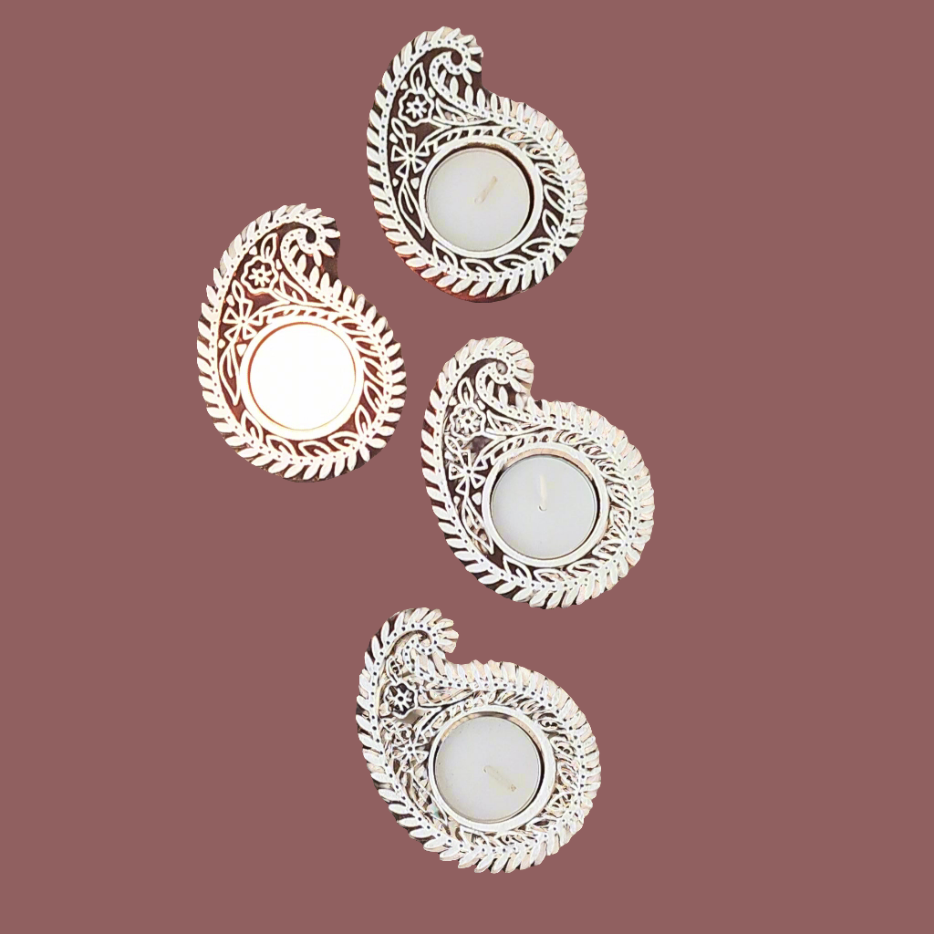 Exquisite Set Of 4 Paisley Design Tea Light Holders Handcrafted in Wood. L 10 cm x W 7.5 cm x Ht 2.5 cm