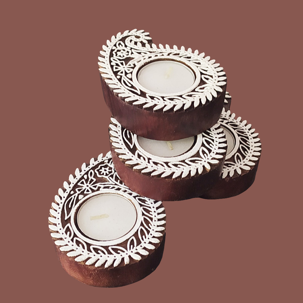 Exquisite Set Of 4 Paisley Design Tea Light Holders Handcrafted in Wood. L 10 cm x W 7.5 cm x Ht 2.5 cm