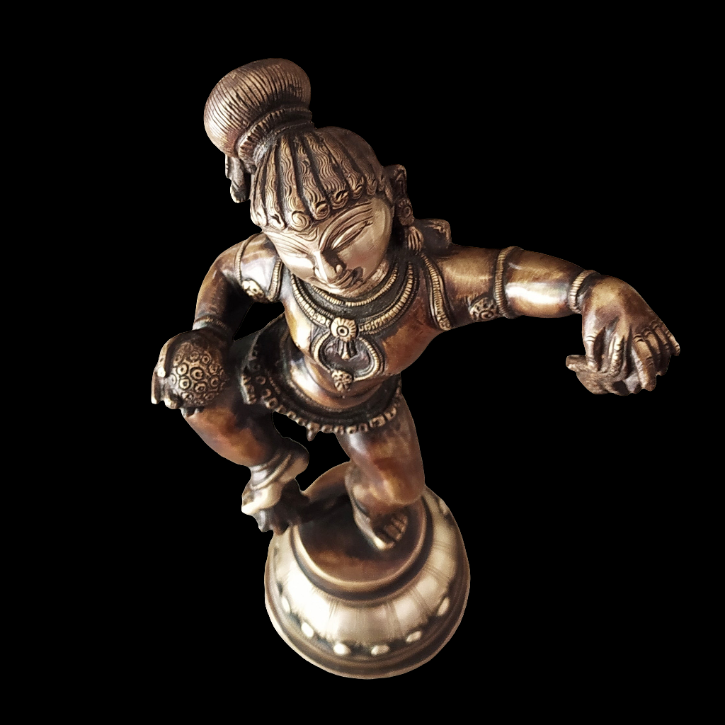 Brass Sculpture of Dancing Krishna Holding A Butter Ball . Height 28 cm x Width 16 cm