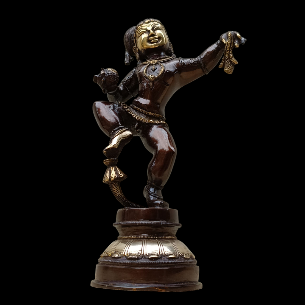 Brass Sculpture of Dancing Krishna Holding A Butter Ball . Height 28 cm x Width 16 cm