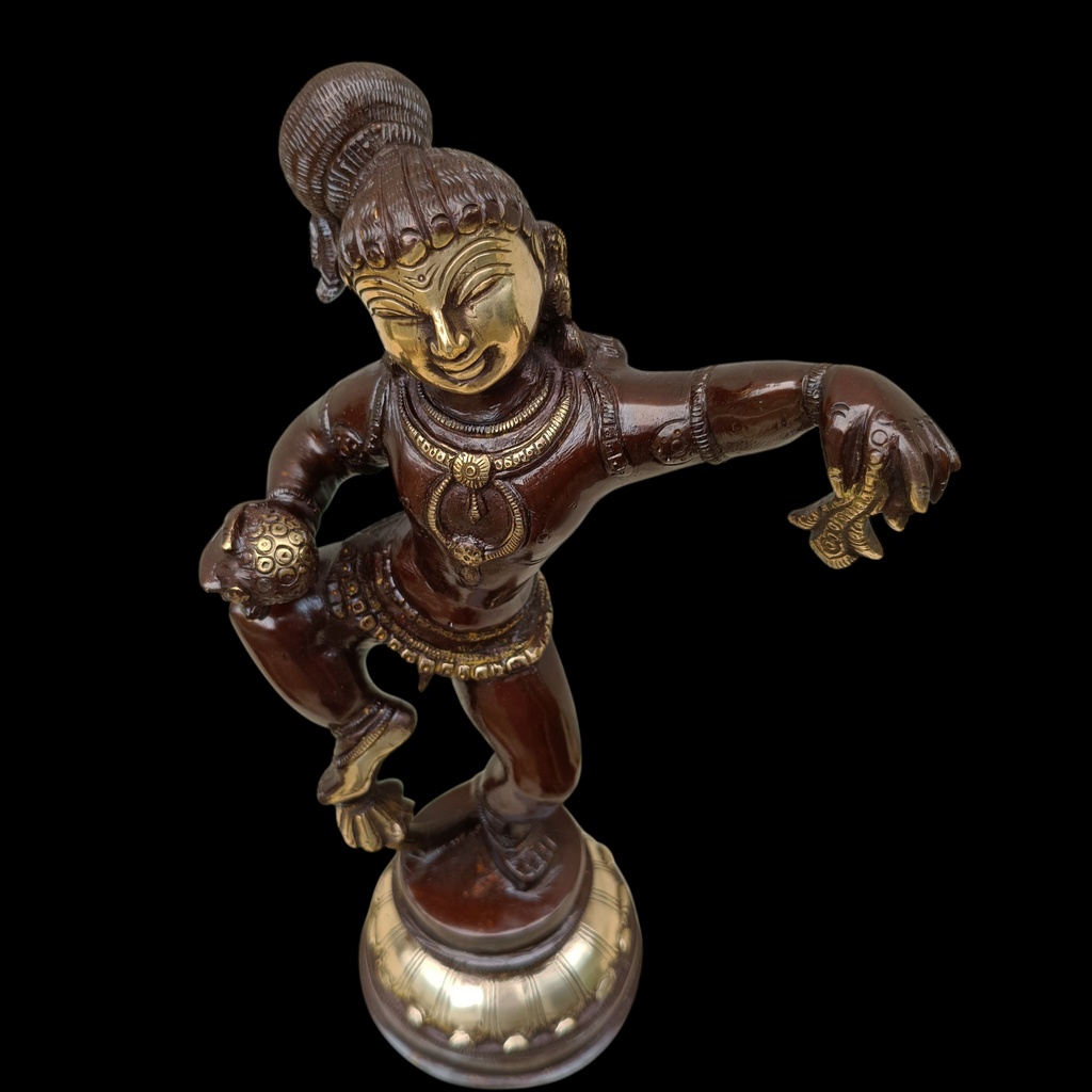 Brass Sculpture of Dancing Krishna Holding A Butter Ball . Height 28 cm x Width 16 cm