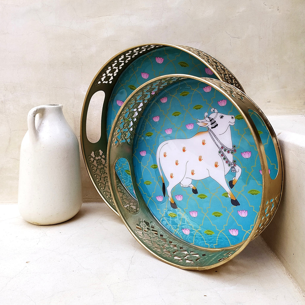 Pair Of Exquisite Round Metal Trays With Pichwai Art Of Nandi. Diameter 25 & 20 cm