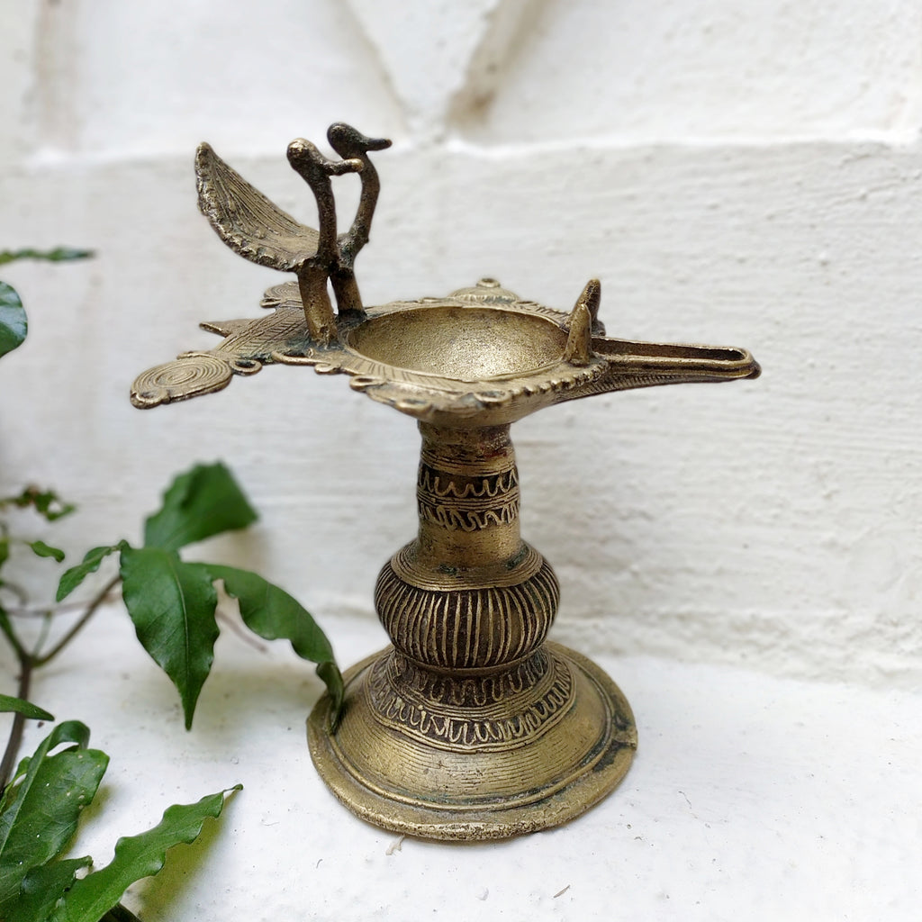 Vintage Odhisa Tribal Dhokra Brass Oil Lamp With Peacocks. L 14.5 cm x Ht 17 cm x Width 12.5 cm