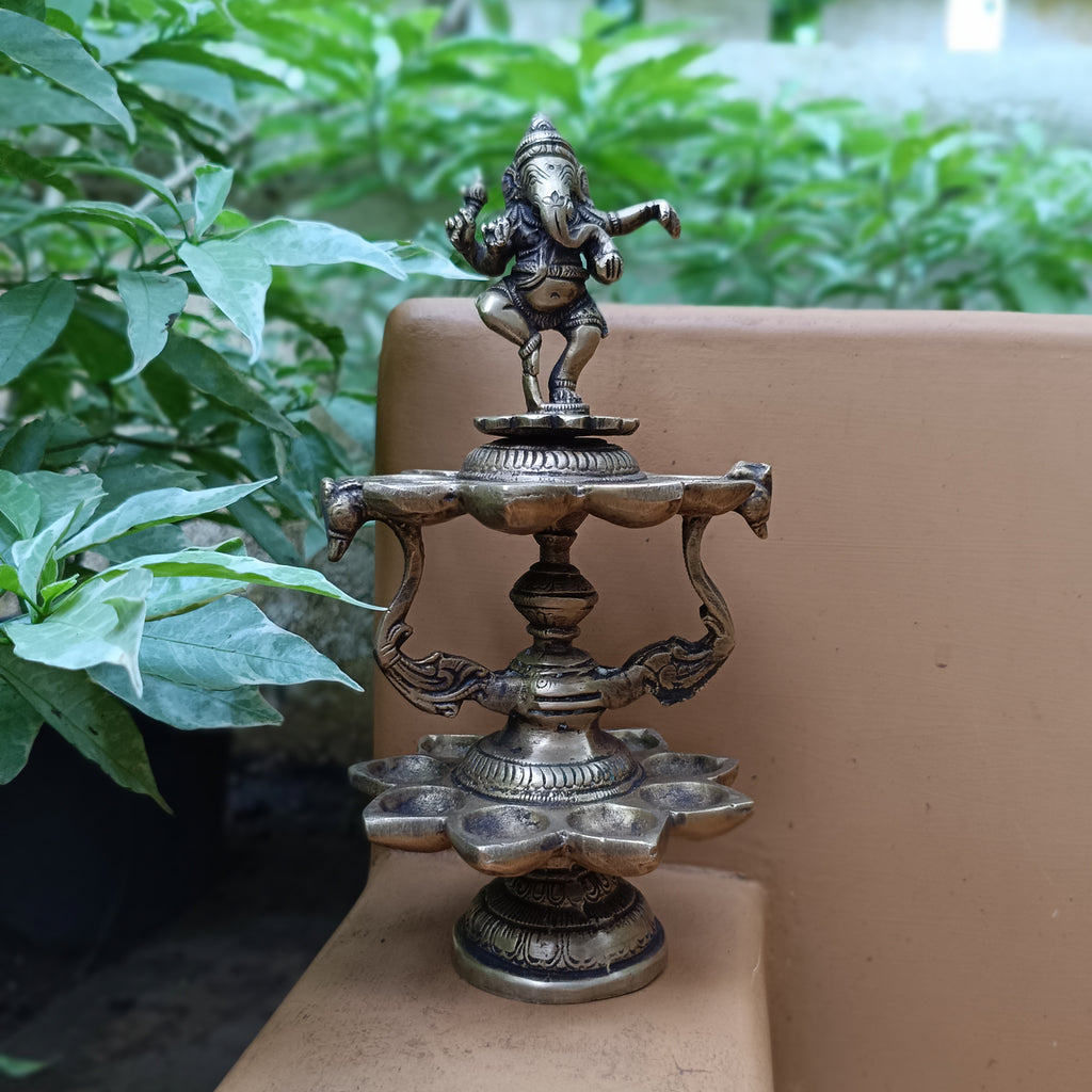 Divine Brass Lamp Of Dancing Ganesha With 18 Oil Diyas. Height 25 cm x Diameter 12 cm