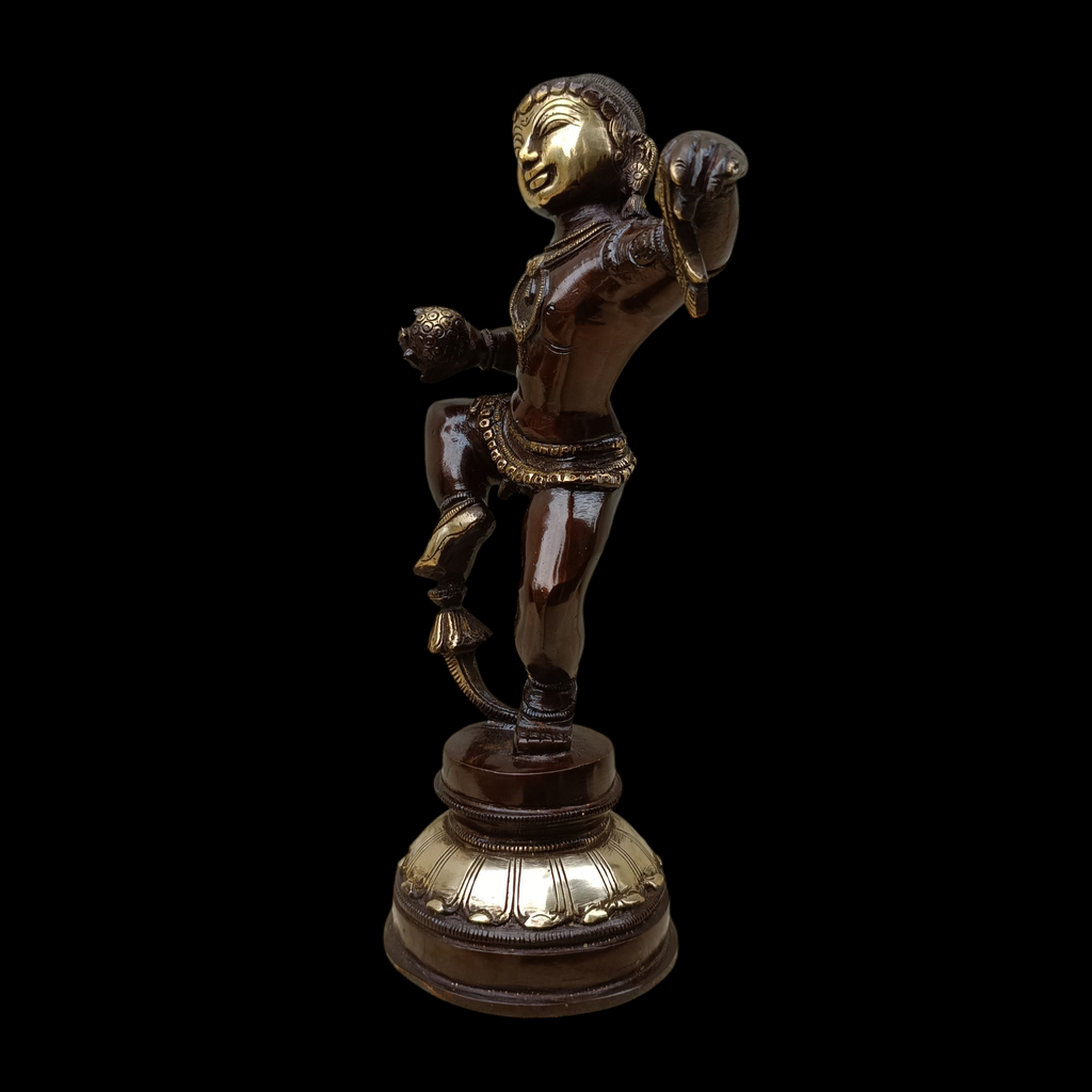 Brass Sculpture of Dancing Krishna Holding A Butter Ball . Height 28 cm x Width 16 cm