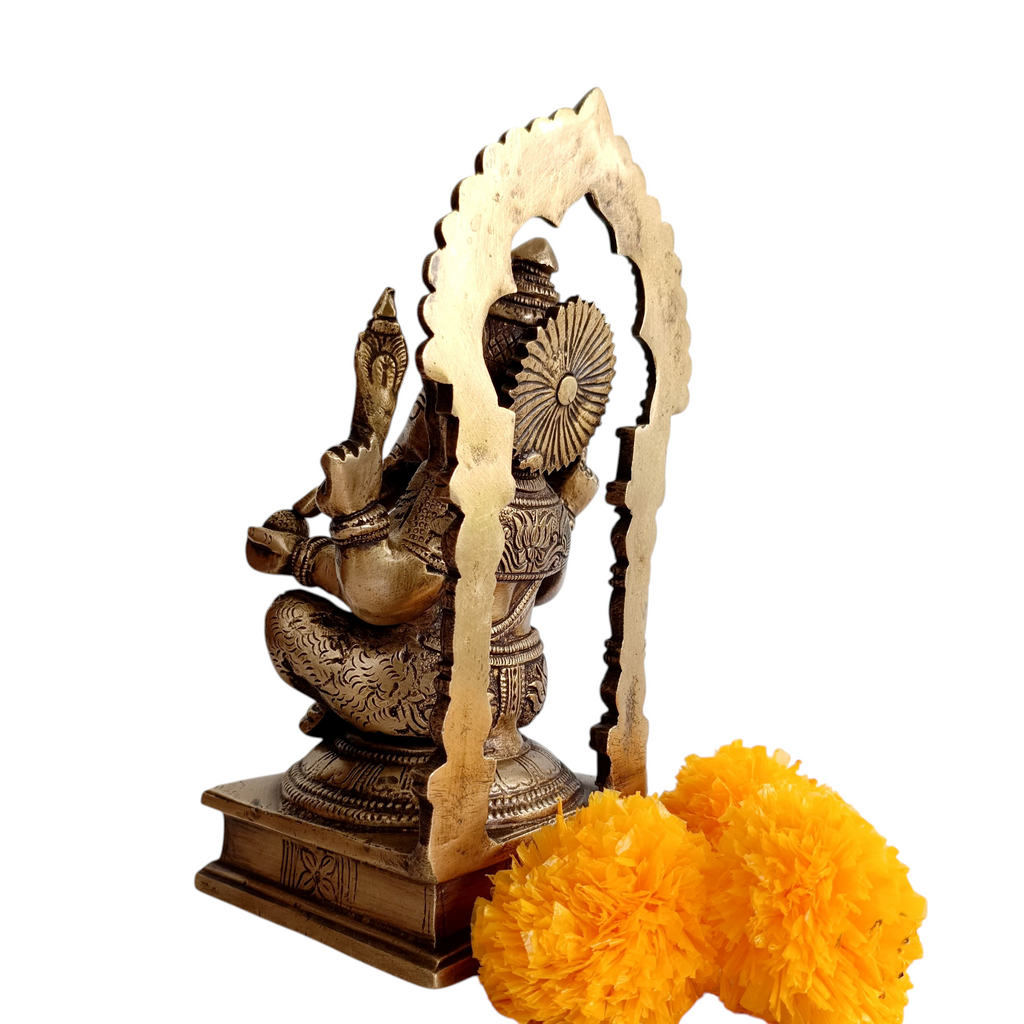 Divine Idol Of Lord Ganesha With Prabhavali - Height 22.5 cm x Width 12 cm x Depth 10 cm