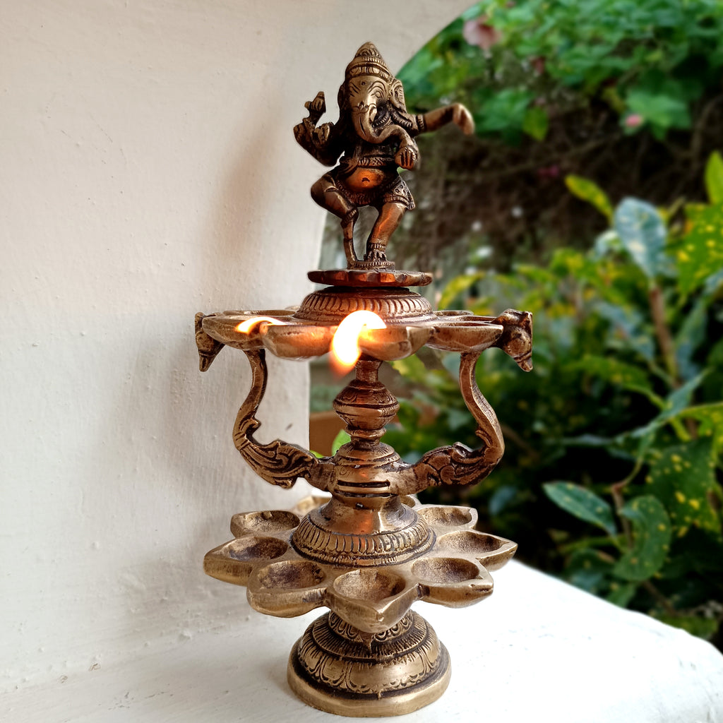 Divine Brass Lamp Of Dancing Ganesha With 18 Oil Diyas. Height 25 cm x Diameter 12 cm