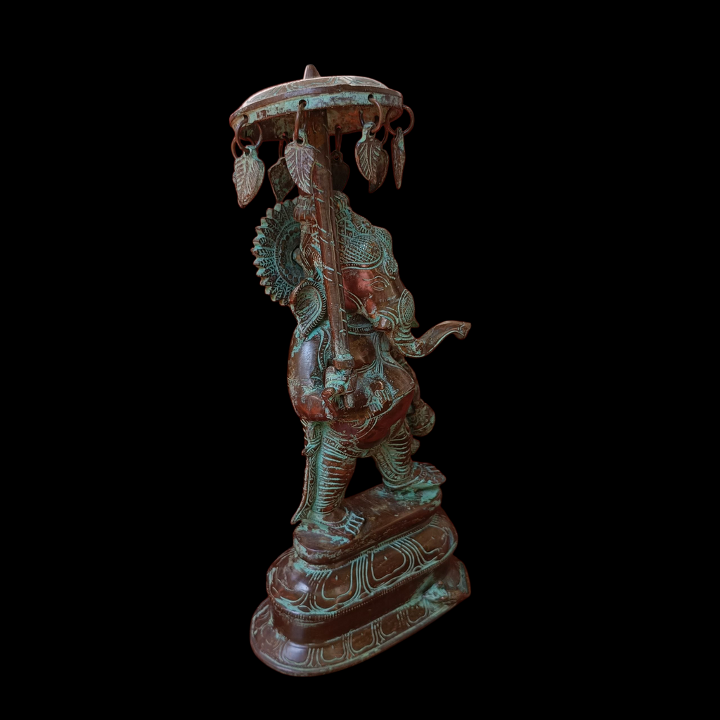 Traditional Ganesha Statue Standing Under Umbrella Holding Modaka & Water Vessel. Height 40 cm