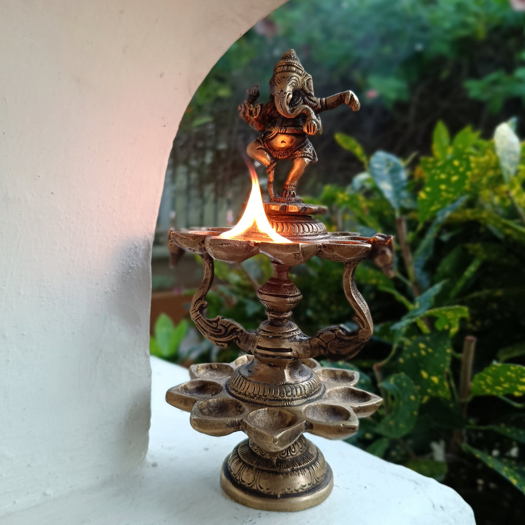 Divine Brass Lamp Of Dancing Ganesha With 18 Oil Diyas. Height 25 cm x Diameter 12 cm