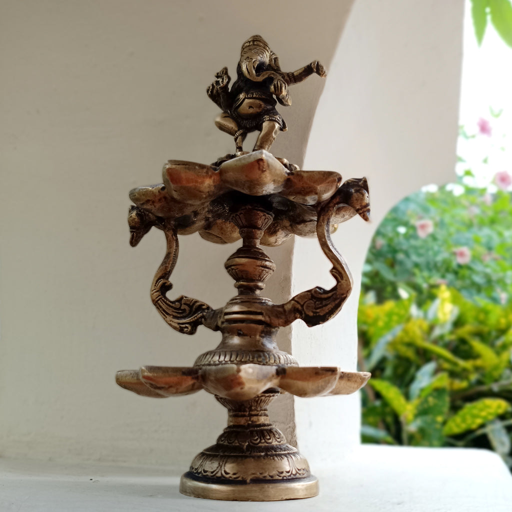 Divine Brass Lamp Of Dancing Ganesha With 18 Oil Diyas. Height 25 cm x Diameter 12 cm