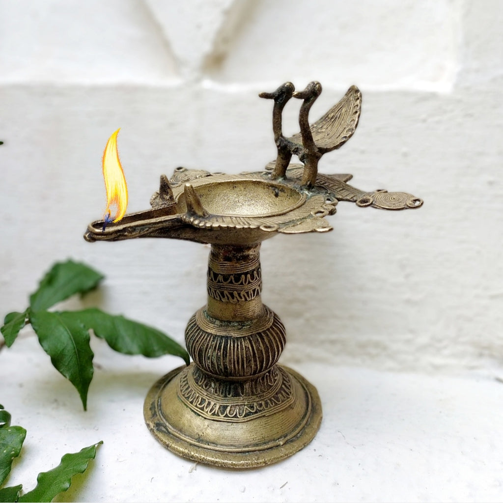 Vintage Odhisa Tribal Dhokra Brass Oil Lamp With Peacocks. L 14.5 cm x Ht 17 cm x Width 12.5 cm