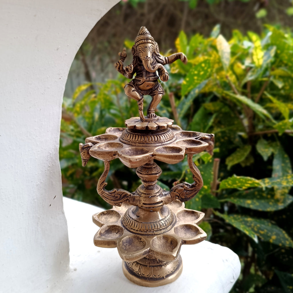 Divine Brass Lamp Of Dancing Ganesha With 18 Oil Diyas. Height 25 cm x Diameter 12 cm