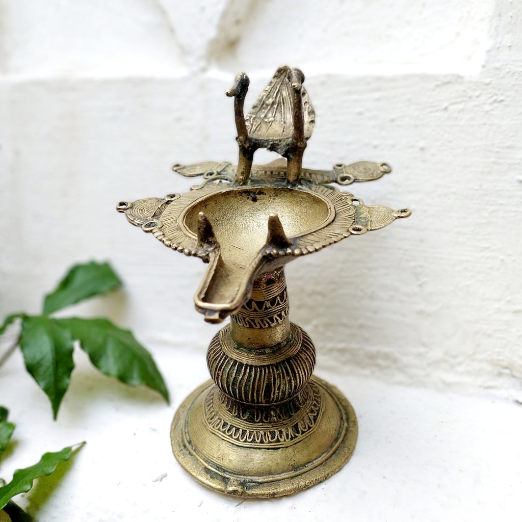 Vintage Odhisa Tribal Dhokra Brass Oil Lamp With Peacocks. L 14.5 cm x Ht 17 cm x Width 12.5 cm