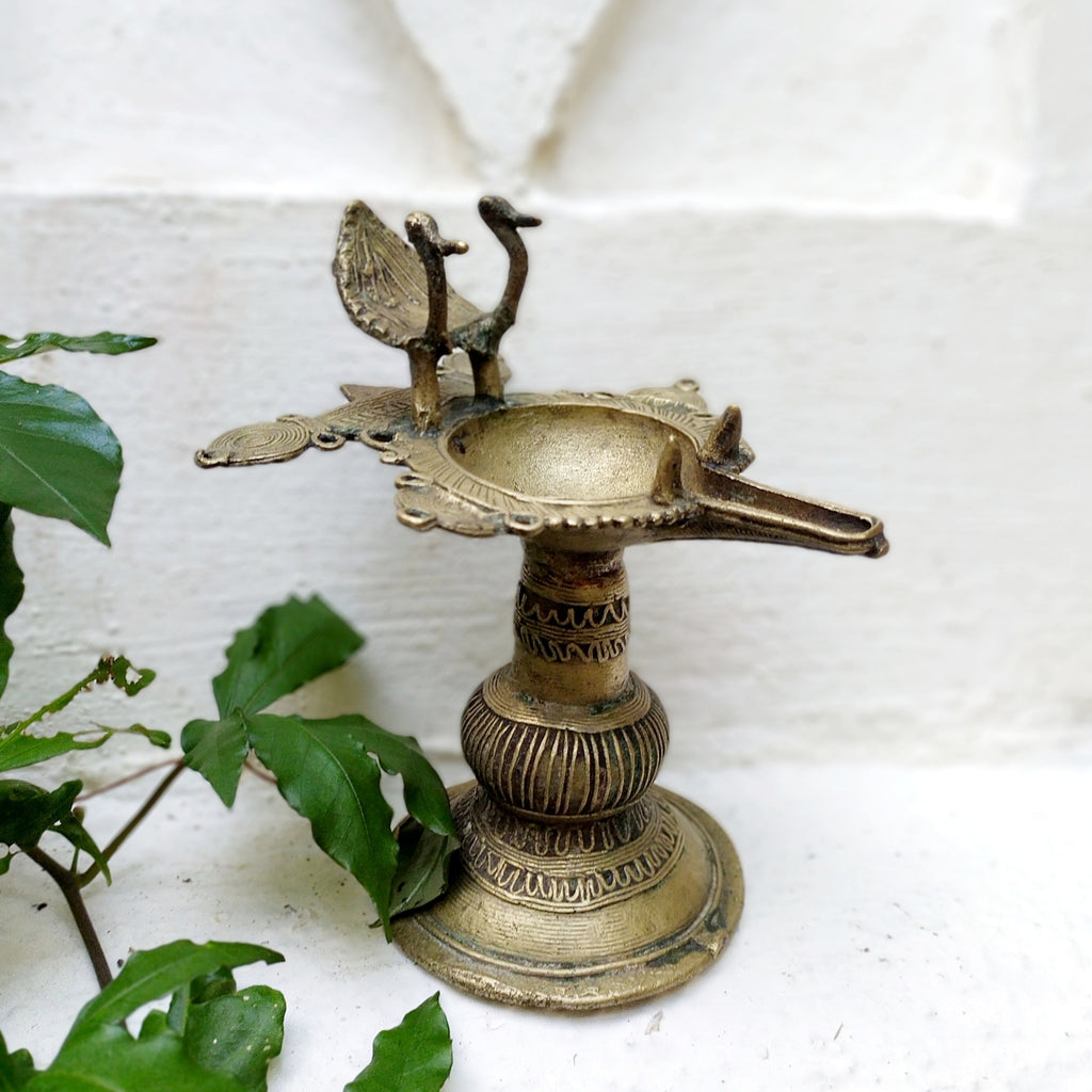 Vintage Odhisa Tribal Dhokra Brass Oil Lamp With Peacocks. L 14.5 cm x Ht 17 cm x Width 12.5 cm