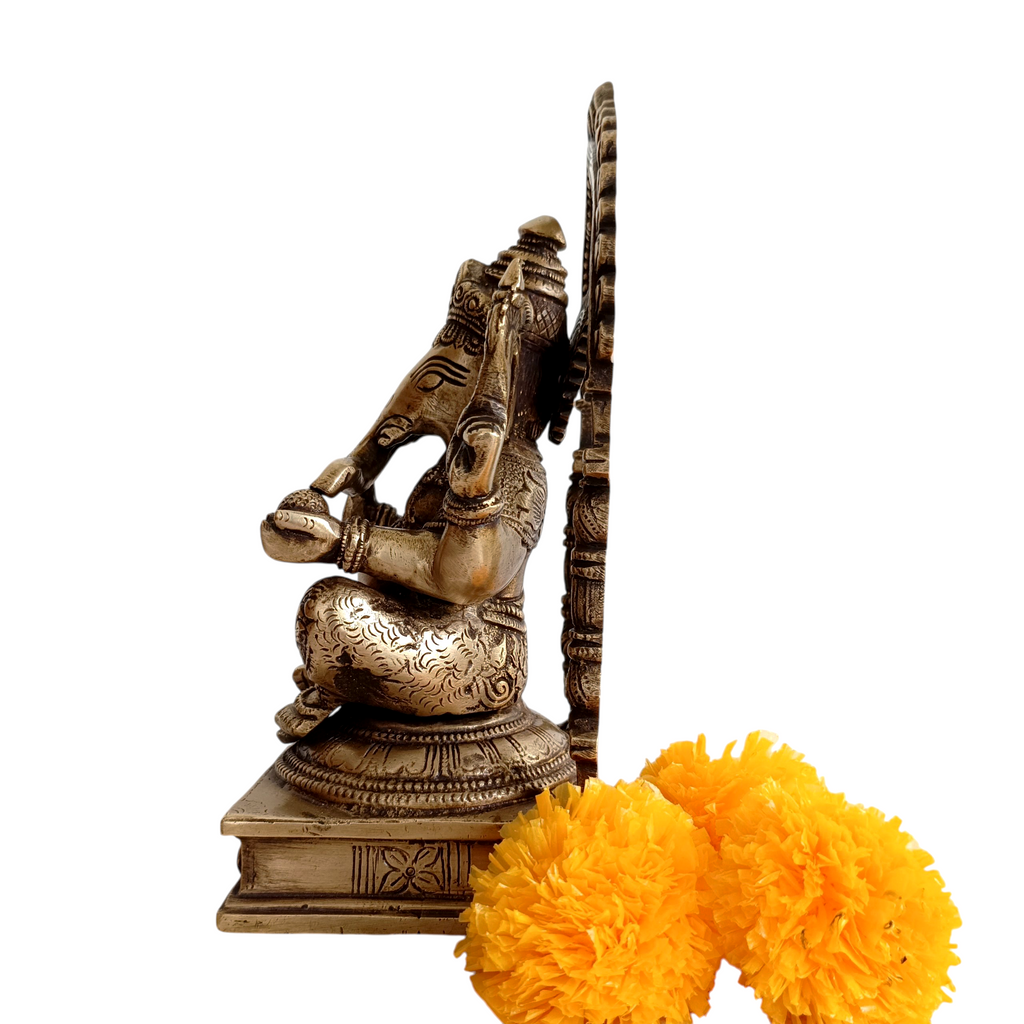 Divine Idol Of Lord Ganesha With Prabhavali - Height 22.5 cm x Width 12 cm x Depth 10 cm