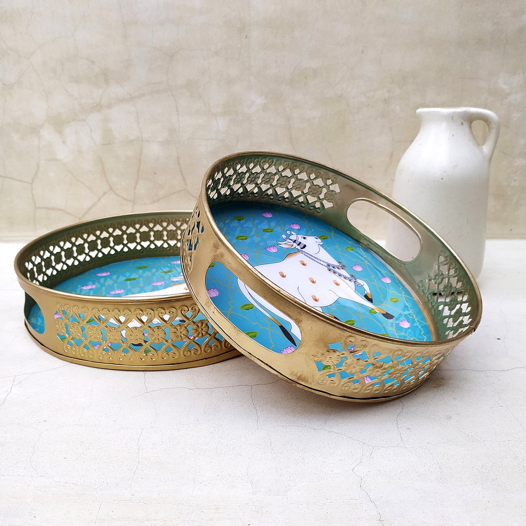 Pair Of Exquisite Round Metal Trays With Pichwai Art Of Nandi. Diameter 25 & 20 cm