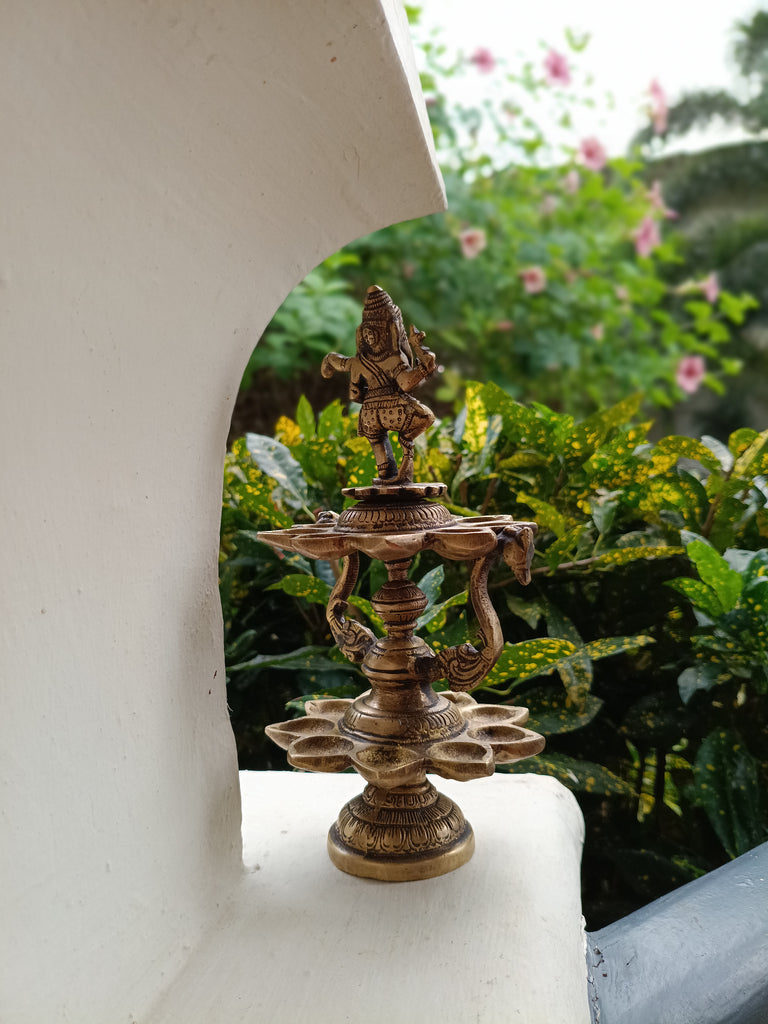 Divine Brass Lamp Of Dancing Ganesha With 18 Oil Diyas. Height 25 cm x Diameter 12 cm