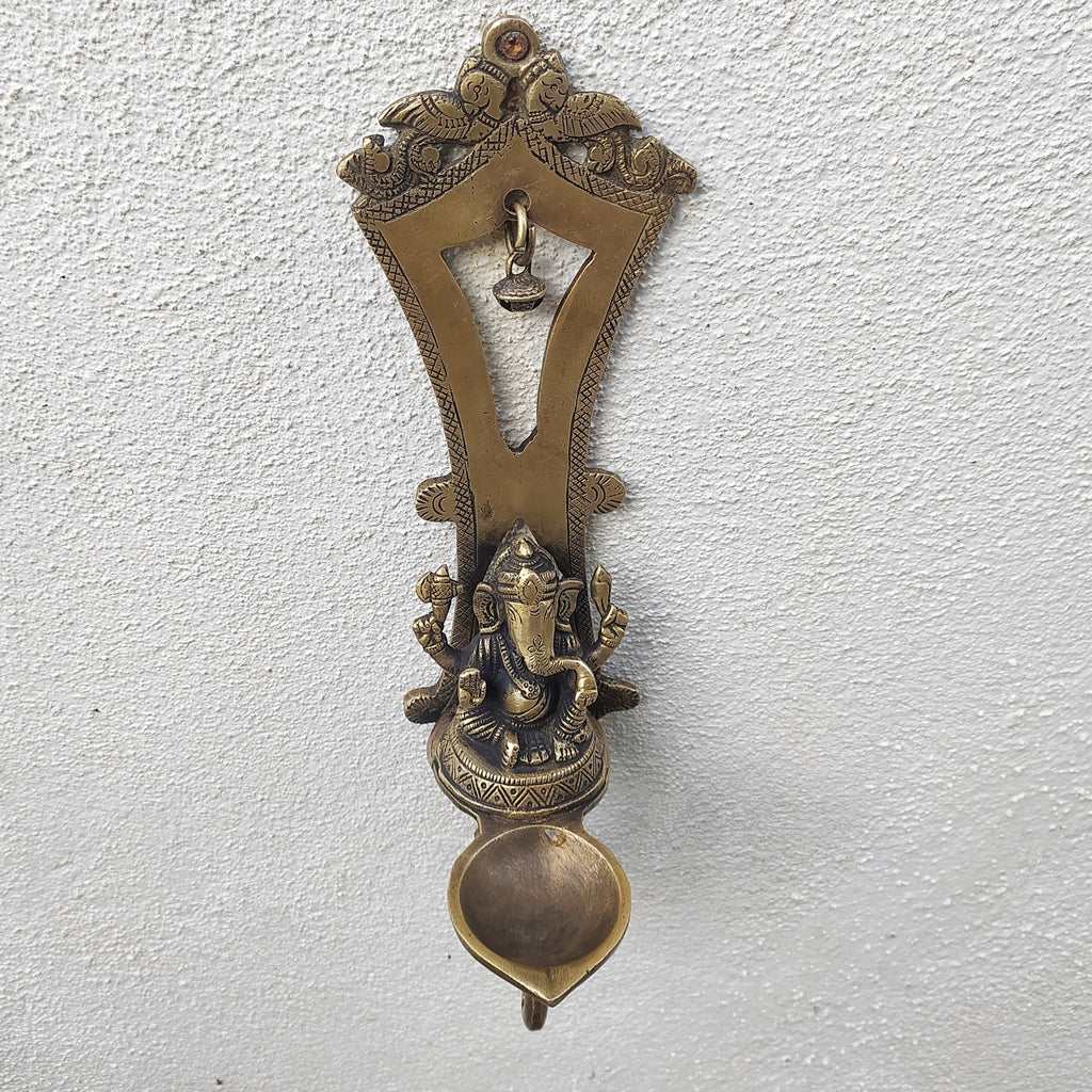 Ornate Brass Wall Hanging Diya With Ganesha - God Of Wisdom. Ht 32 cm x W 9.5 cm