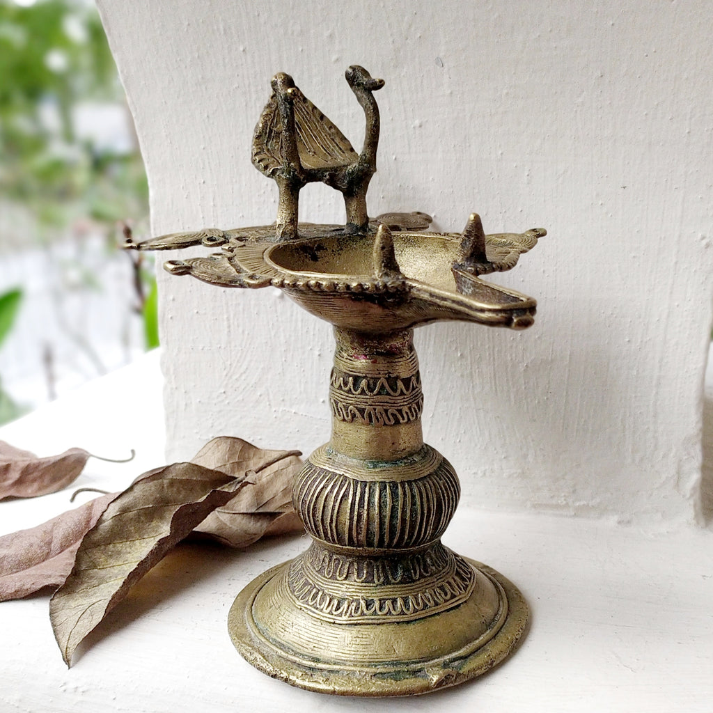 Vintage Odhisa Tribal Dhokra Brass Oil Lamp With Peacocks. L 14.5 cm x Ht 17 cm x Width 12.5 cm