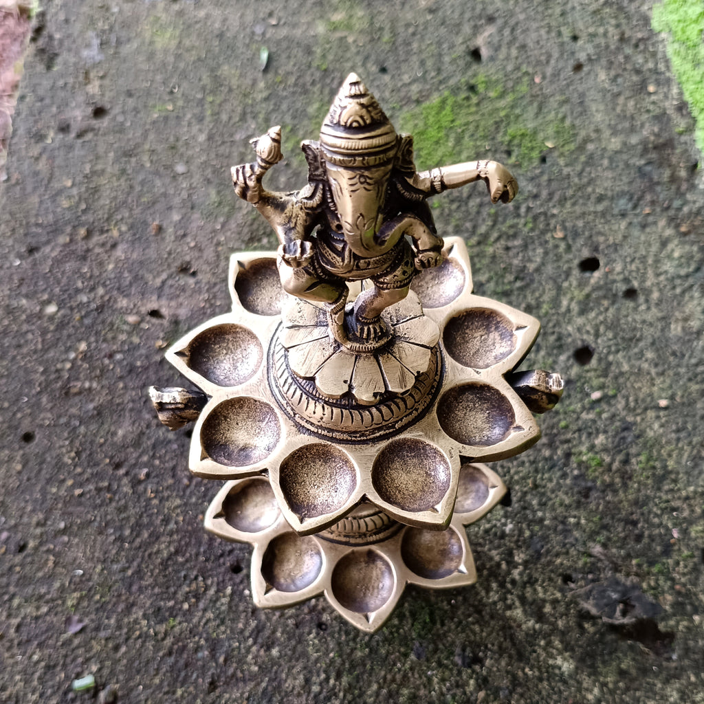Divine Brass Lamp Of Dancing Ganesha With 18 Oil Diyas. Height 25 cm x Diameter 12 cm