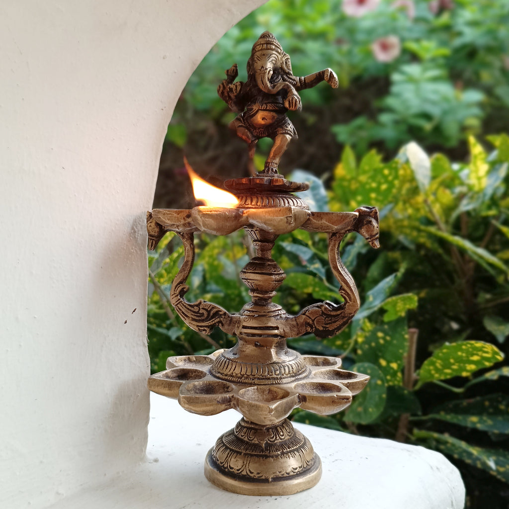 Divine Brass Lamp Of Dancing Ganesha With 18 Oil Diyas. Height 25 cm x Diameter 12 cm