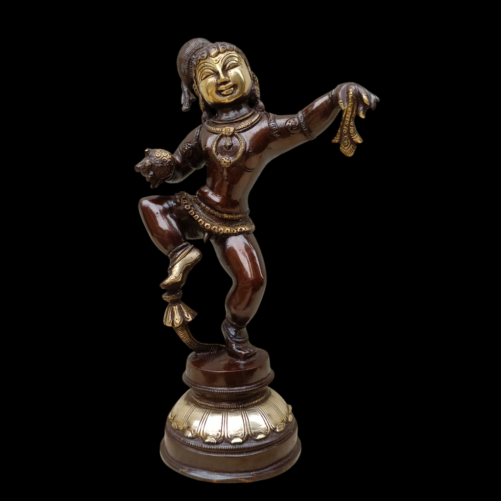 Brass Sculpture of Dancing Krishna Holding A Butter Ball . Height 28 cm x Width 16 cm