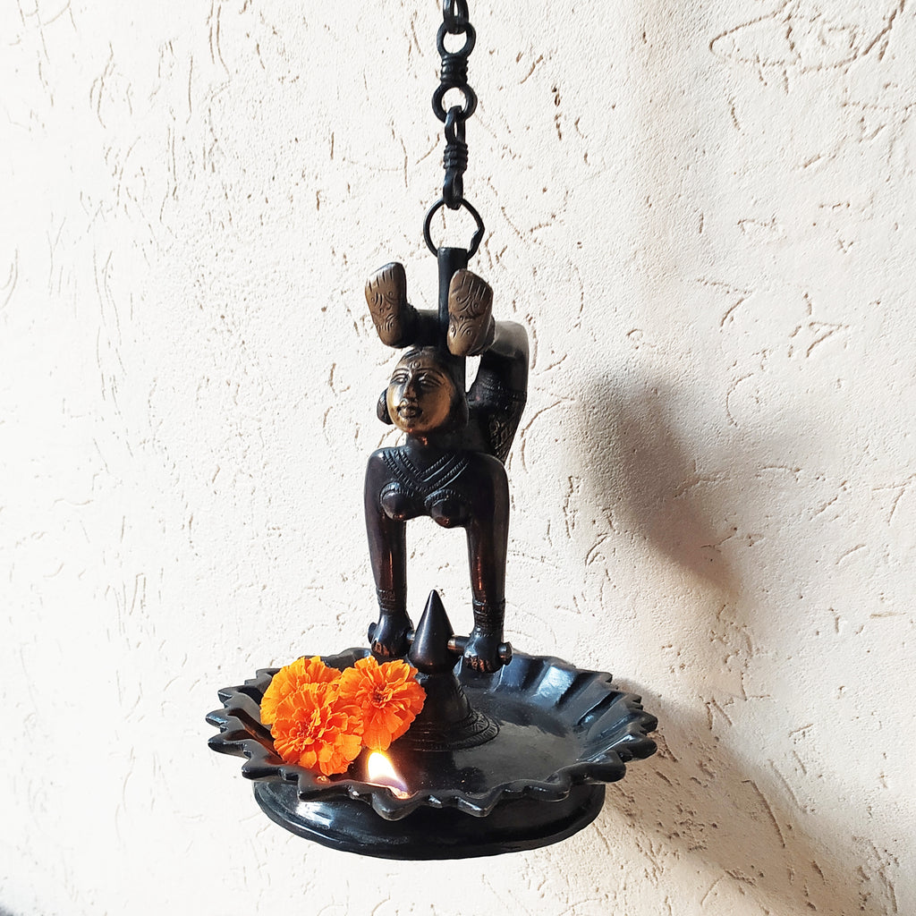 Brass Yogasana Lady Lamp In Vrishchikasana Posture. Length 107 cm x Dia 18 cm