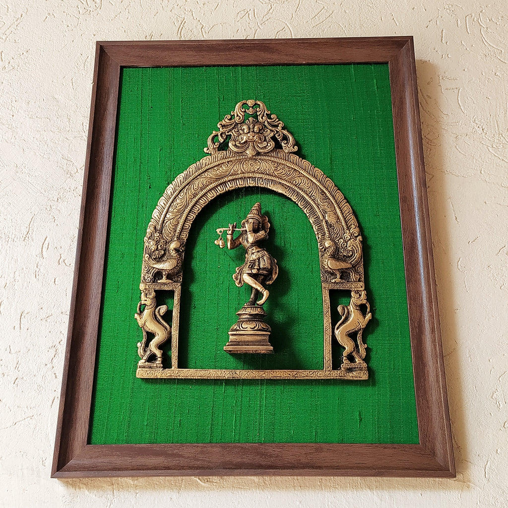 Divine Brass Prabhavali Framed On Emerald Green Raw Silk With Lord Krishna. Frame Size: Height 45 cm x Width 35 cm