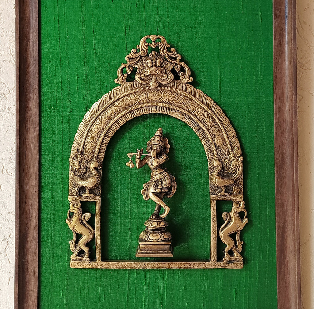 Divine Brass Prabhavali Framed On Emerald Green Raw Silk With Lord Krishna. Frame Size: Height 45 cm x Width 35 cm