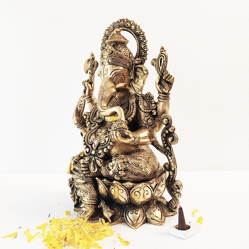 Brass Sculpture of Mangalkari Ganesha On Lotus. H 33 cm x W 23 cm x Dia 17 cm