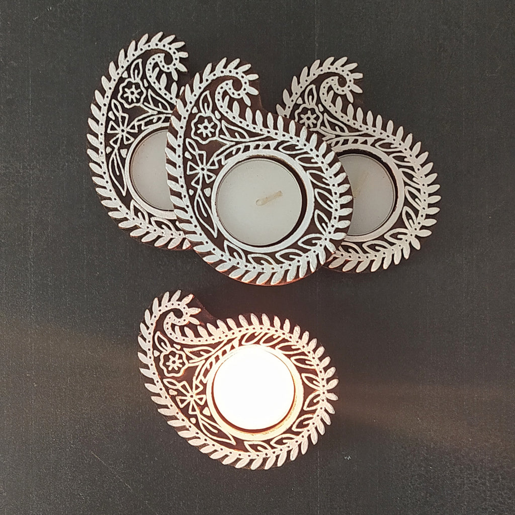 Exquisite Set Of 4 Paisley Design Tea Light Holders Handcrafted in Wood. L 10 cm x W 7.5 cm x Ht 2.5 cm