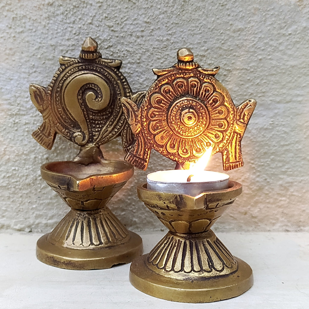Pair of Brass Sangu Chakara Vishnu Oil Lamps from South India. Ht 11 cm x Dia 5.5 cm