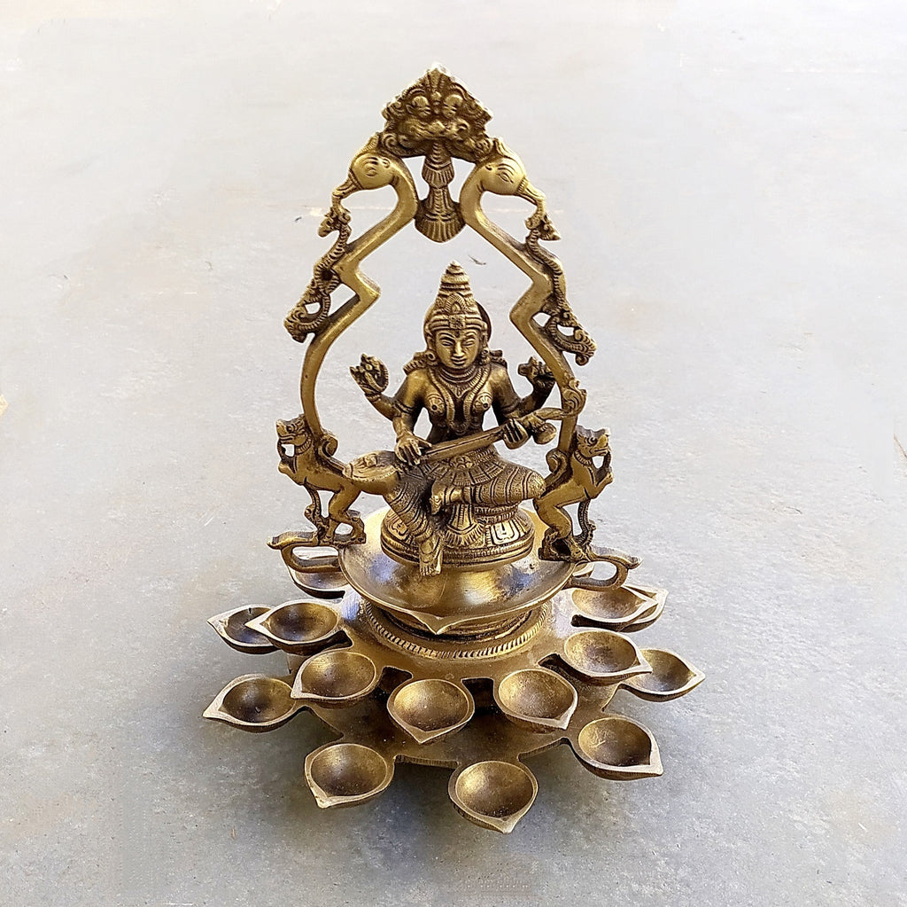 Brass Sculpture Of Saraswati - Goddess of Music, Art and Learning With 20 Diyas. Height 31 cm x Dia 24 cm