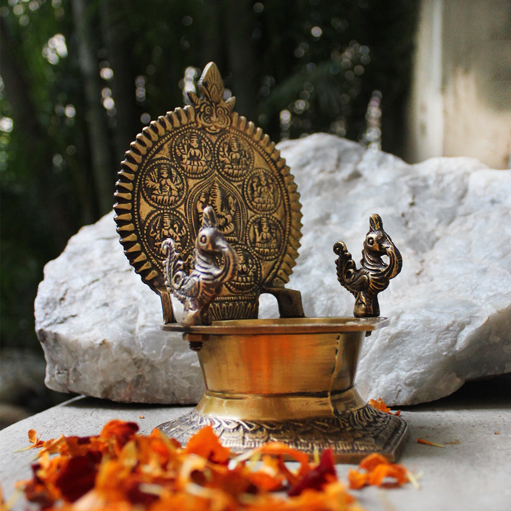 Traditional Ashtalakshmi Vilakku - Divine Brass Oil Lamp With Peacocks. Ht 18 cm x W 12 cm x L 14 cm