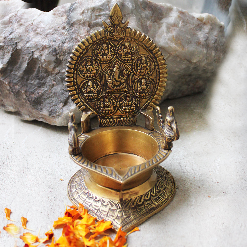 Traditional Ashtalakshmi Vilakku - Divine Brass Oil Lamp With Peacocks. Ht 18 cm x W 12 cm x L 14 cm