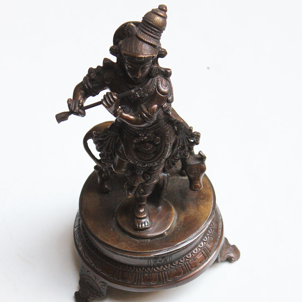 Brass Sculpture of Lord Krishna With The Sacred Cow In A Rich Dark Brown Patina - Ht 25 cm