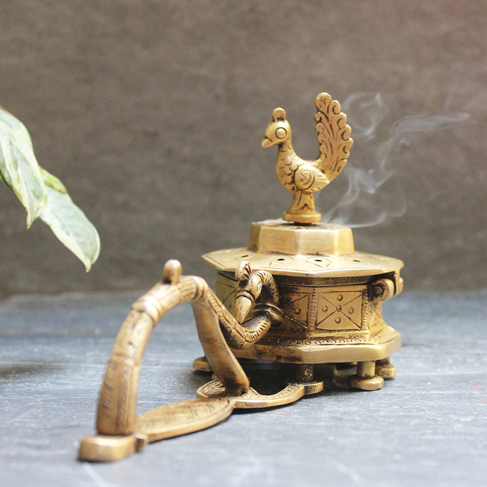 Octagonal Brass Incense Burner With A Peacock Handle & The Mythical Hamsa - L 20 cm x W 8 cm x H 6 cm