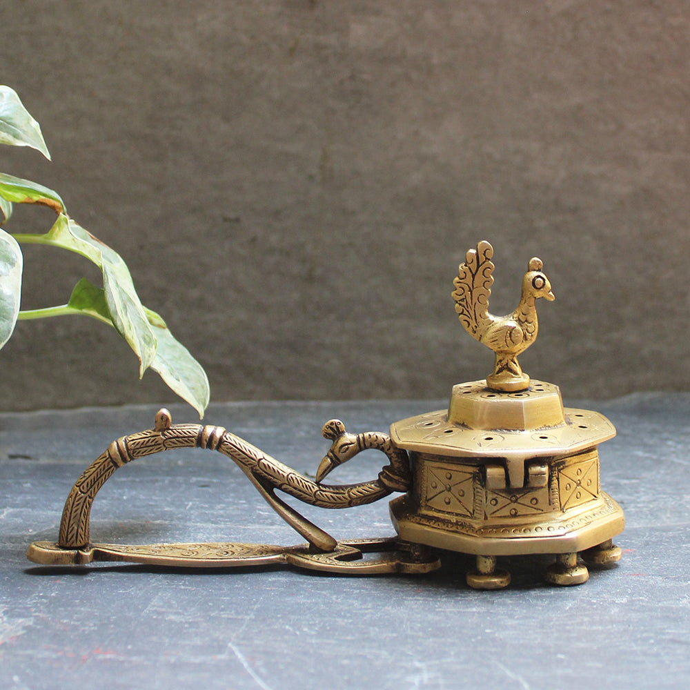 Octagonal Brass Incense Burner With A Peacock Handle & The Mythical Hamsa - L 20 cm x W 8 cm x H 6 cm