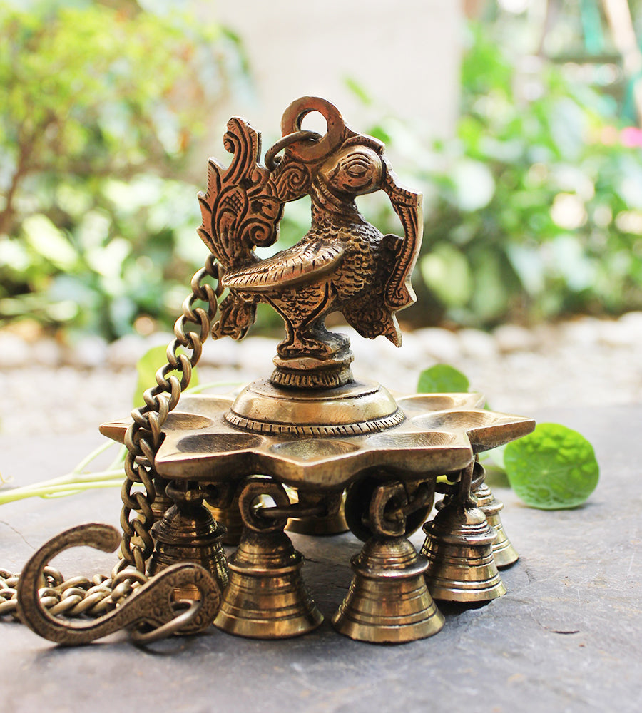 Handcrafted Exquisite Peacock Oil Lamp with 9 Diyas & 9 Bells On A Chain- Length 55 cm x Dia 13 cm - theindianweave