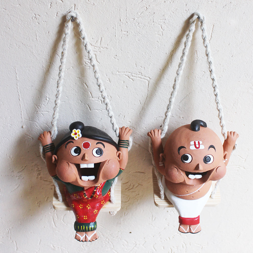 Captivating Terracotta Fun Figures Of Indian Priest & His Wife On Swings - Ht 35 cm x W 13 cm x D 15 cm